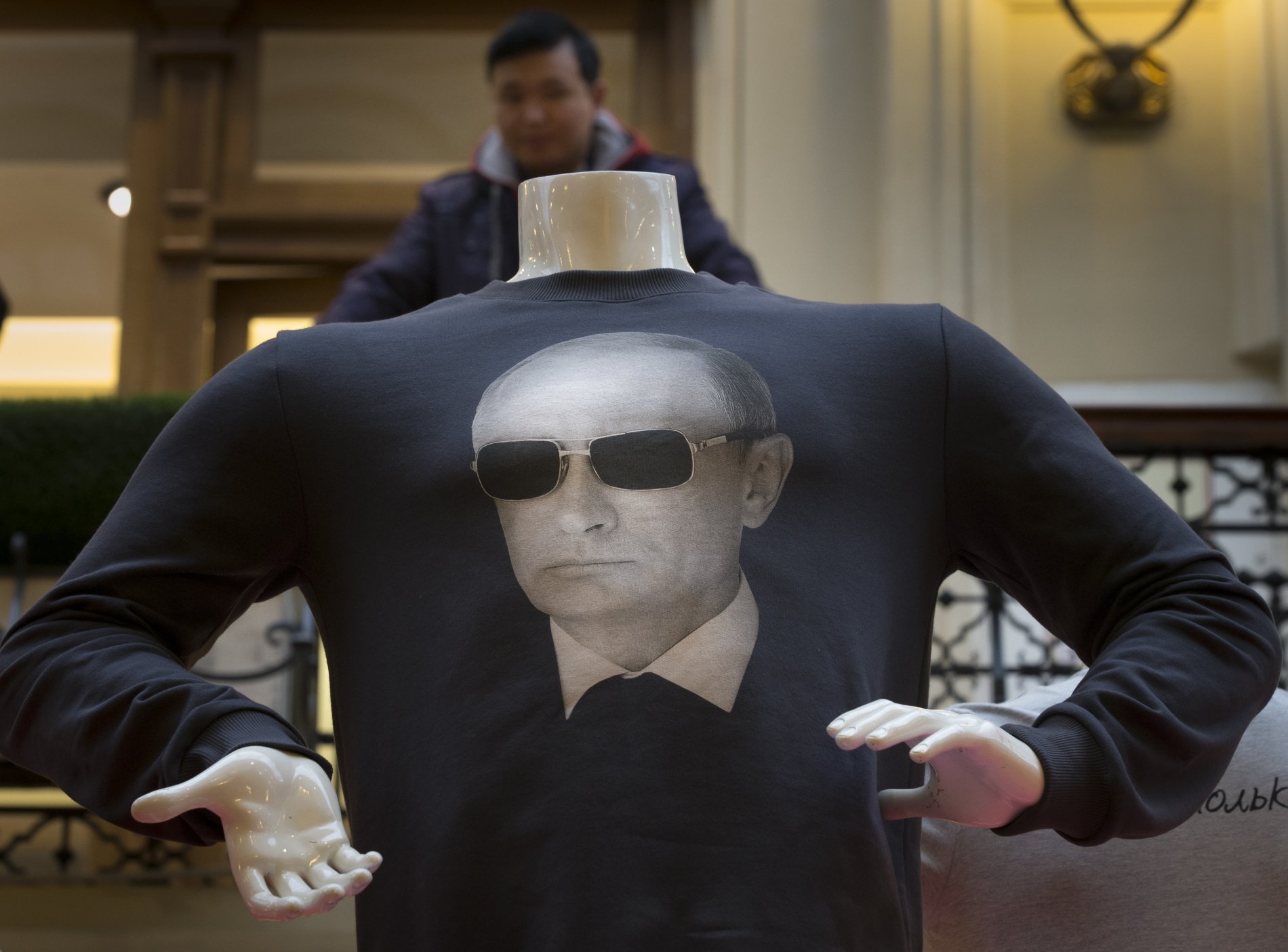 Trička s Vladimirem Putinem jsou letos v Rusku populární.