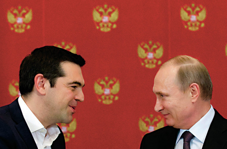 Russian President Vladimir Putin (R) and Greek Prime Minister Alexis Tsipras attend a signing ceremony at the Kremlin in Moscow April 8