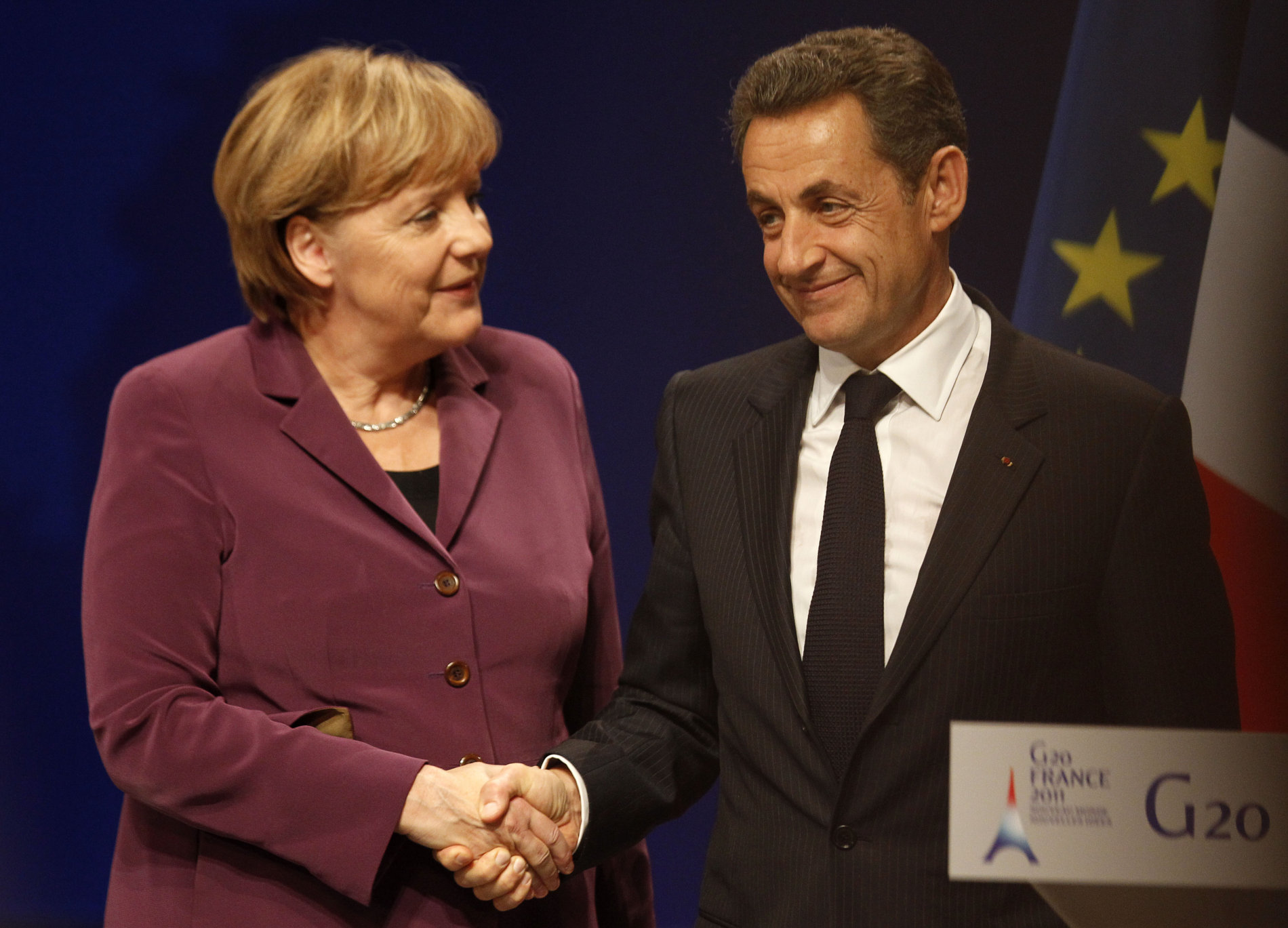 Německá kancléřka Angela Merkelová a francouzský prezident Nicolas Sarkozy na summitu G20 v Cannes.