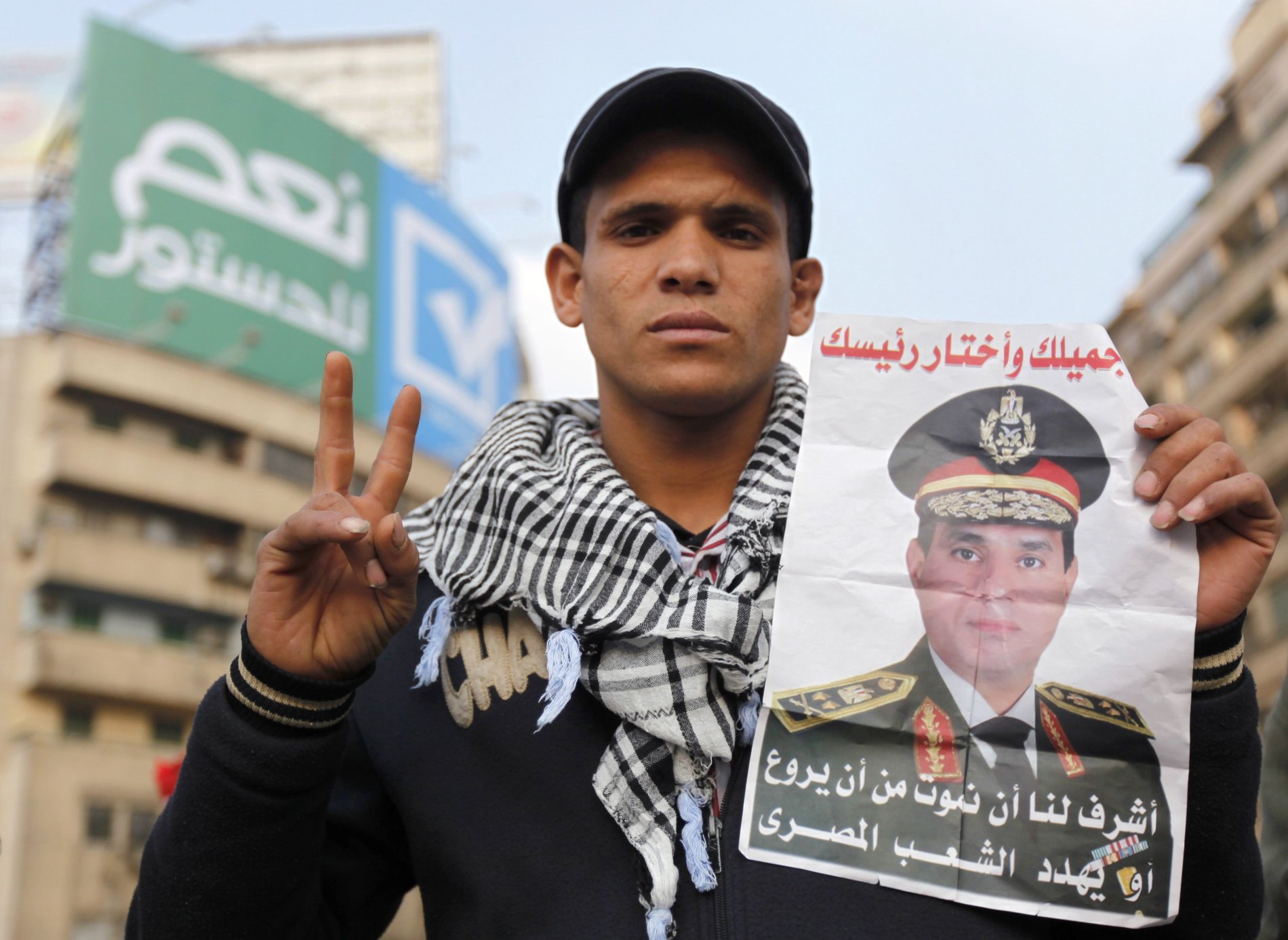 Generál Sisi (na plakátu) má mezi Egypťany silnou podporu