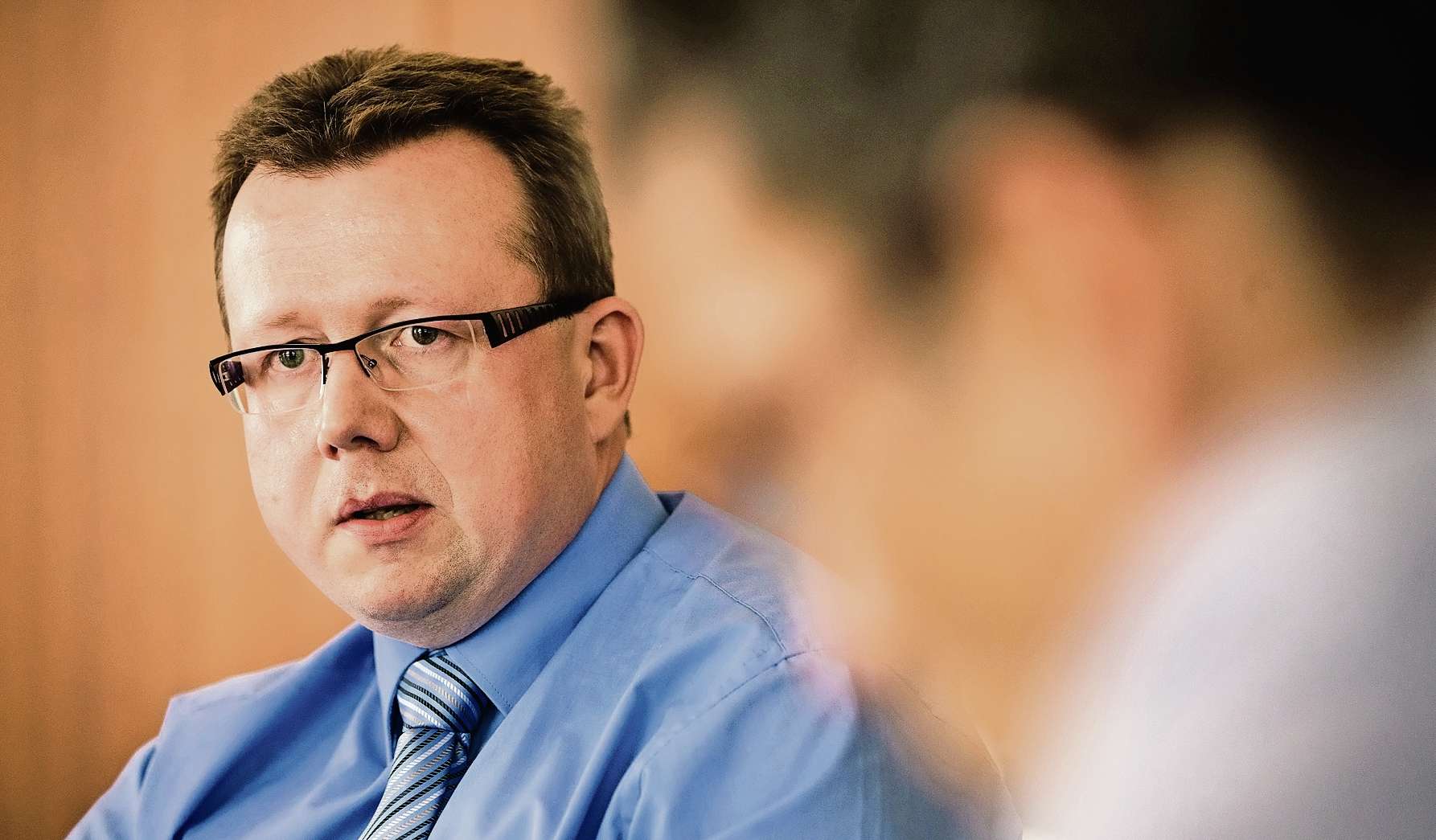 Milan Komárek vede protikorupční policii krátce, od ministra Martina Peciny prý nikdy žádné výhrady neslyšel.