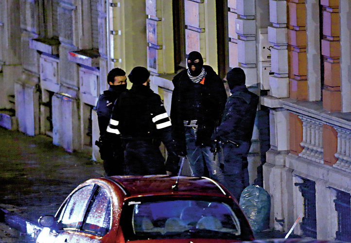 Belgian special forces police block a street in central Verviers
