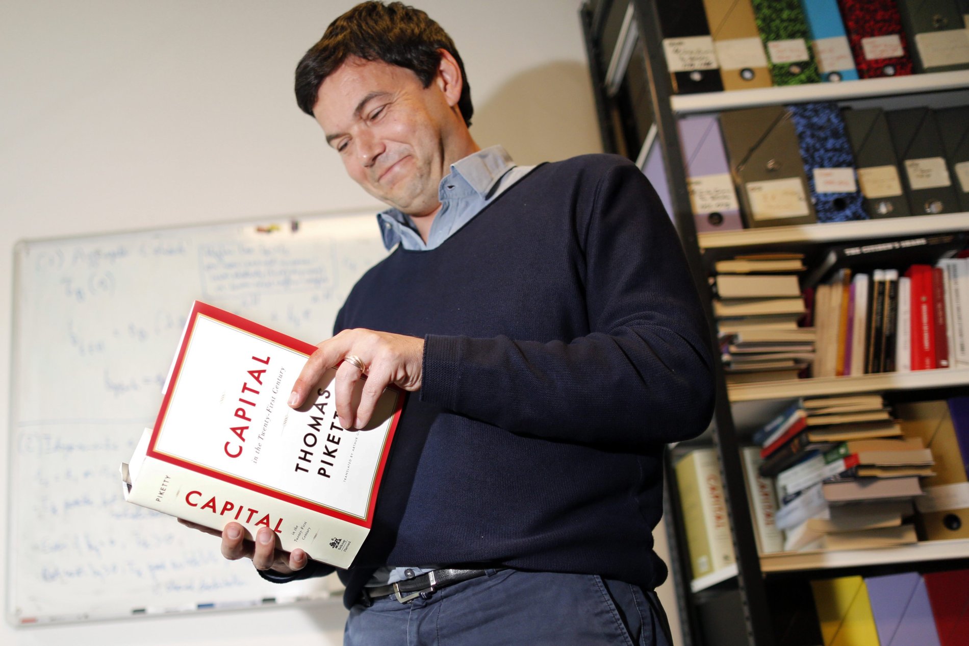 Francouzský ekonom Thomas Piketty se svým dílem Kapitál ve 21. století